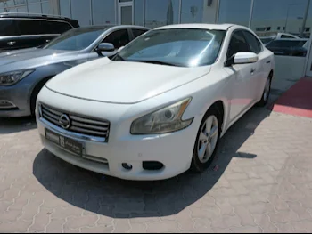 Nissan  Maxima  2011  Automatic  281,000 Km  4 Cylinder  Rear Wheel Drive (RWD)  Sedan  White