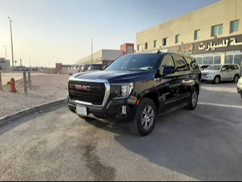 GMC  Yukon  SLE  2022  Automatic  44,000 Km  8 Cylinder  Rear Wheel Drive (RWD)  SUV  Dark Blue  With Warranty