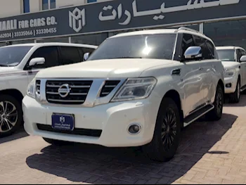 Nissan  Patrol  Platinum  2014  Automatic  340,000 Km  8 Cylinder  Four Wheel Drive (4WD)  SUV  White