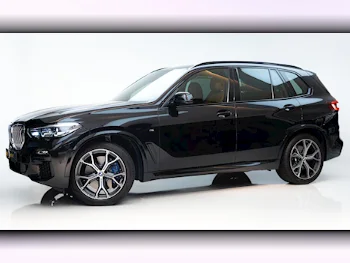 BMW  X-Series  X5 M  2021  Automatic  33٬000 Km  6 Cylinder  Four Wheel Drive (4WD)  SUV  Black  With Warranty