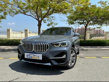 BMW  X-Series  X1  2021  Automatic  49,000 Km  4 Cylinder  Four Wheel Drive (4WD)  SUV  Gray  With Warranty