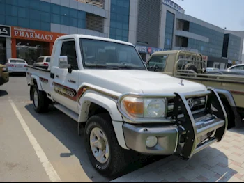 Toyota  Land Cruiser  LX  2012  Manual  141,000 Km  6 Cylinder  Four Wheel Drive (4WD)  Pick Up  Silver