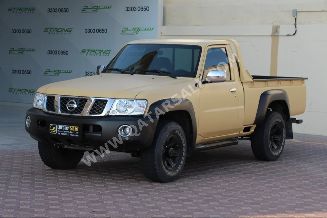 Nissan  Patrol  Pickup  2020  Manual  65,000 Km  6 Cylinder  Four Wheel Drive (4WD)  Pick Up  Beige  With Warranty