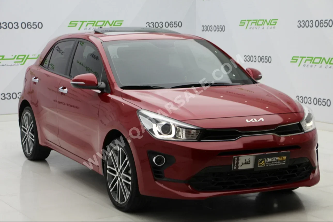 Kia  Rio  2022  Automatic  33,000 Km  4 Cylinder  Front Wheel Drive (FWD)  Sedan  Red  With Warranty