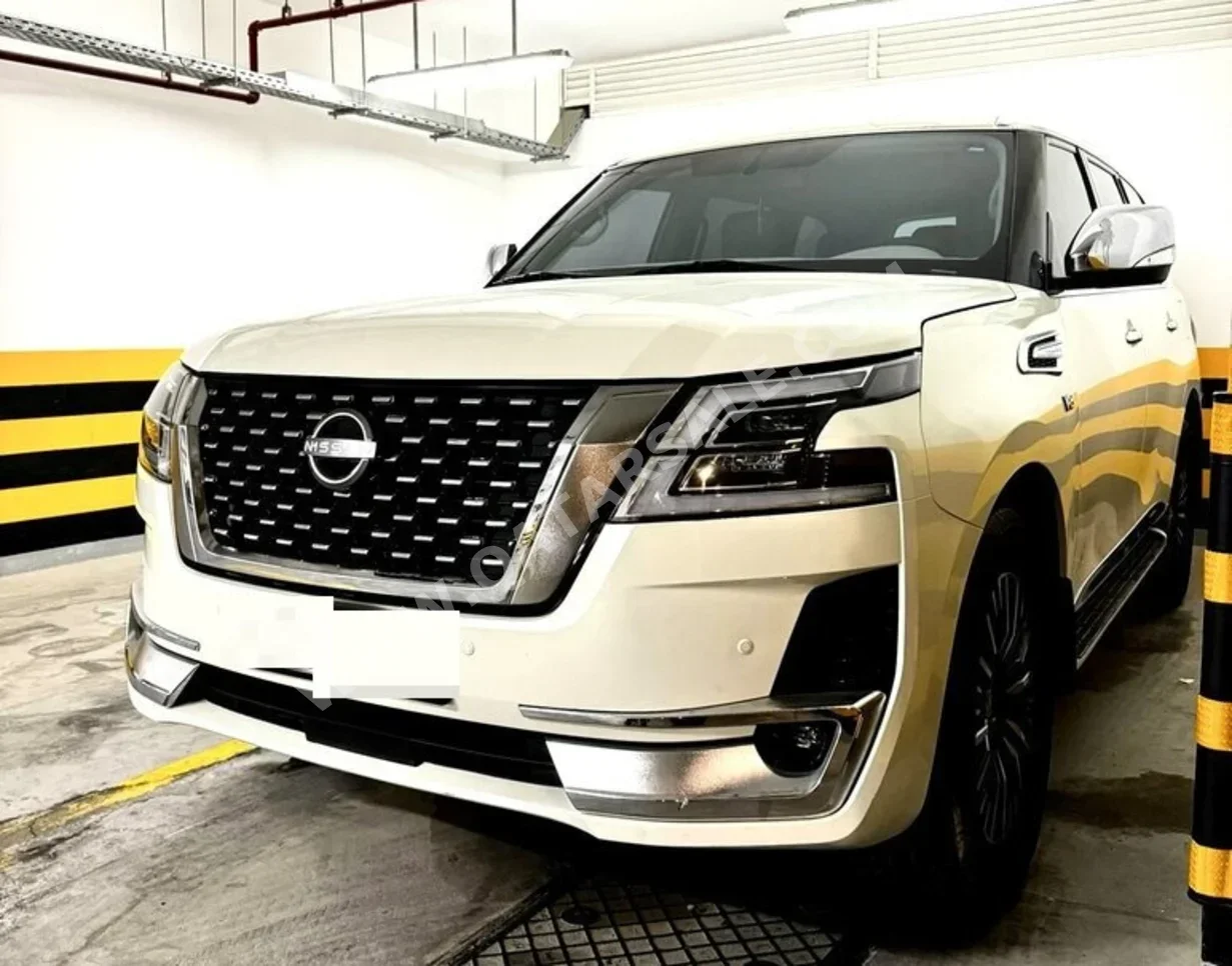 Nissan  Patrol  Platinum  2013  Automatic  180,000 Km  8 Cylinder  Four Wheel Drive (4WD)  SUV  White