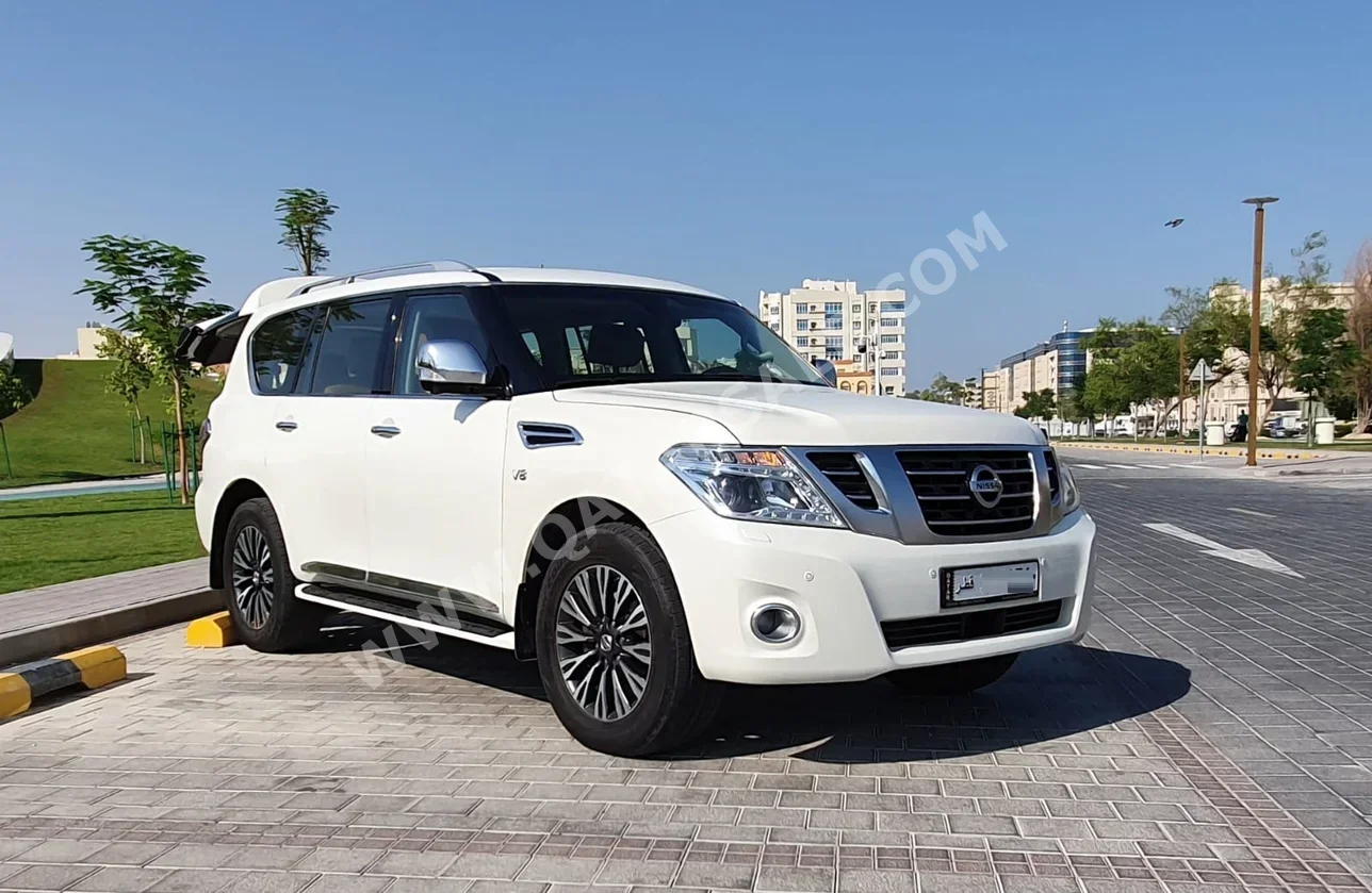 Nissan  Patrol  Platinum  2016  Automatic  328,000 Km  8 Cylinder  Four Wheel Drive (4WD)  SUV  White