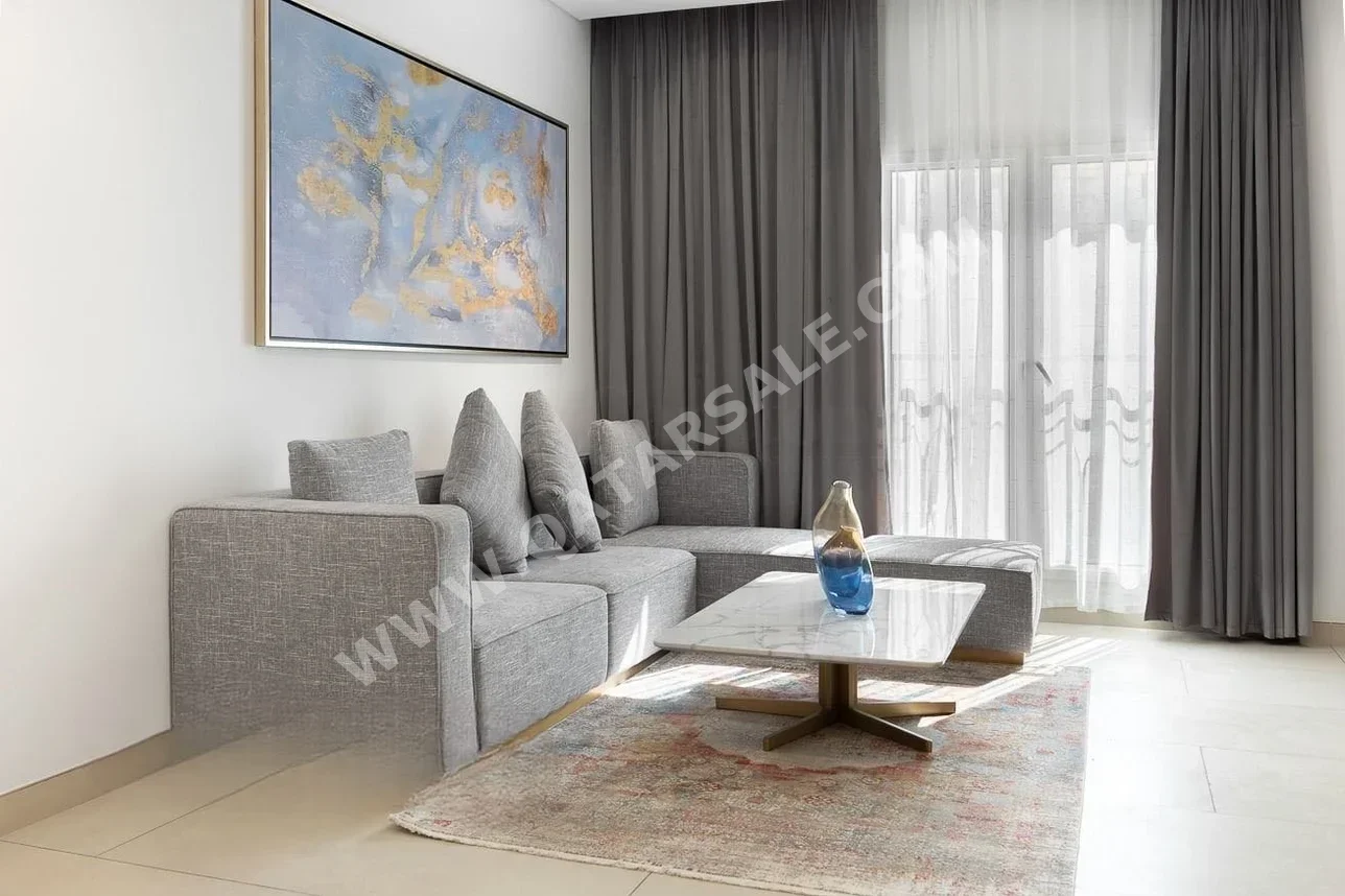 2 Bedrooms  Apartment  For Rent  in Doha -  Al Mansoura  Fully Furnished