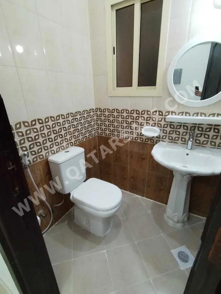 2 Bedrooms  Apartment  For Rent  in Doha -  Old Airport  Not Furnished