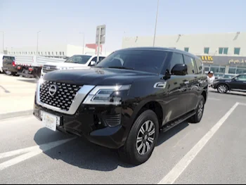 Nissan  Patrol  XE  2023  Automatic  31,000 Km  6 Cylinder  Four Wheel Drive (4WD)  SUV  Black  With Warranty