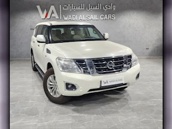 Nissan  Patrol  SE  2015  Automatic  224,000 Km  8 Cylinder  Four Wheel Drive (4WD)  SUV  White