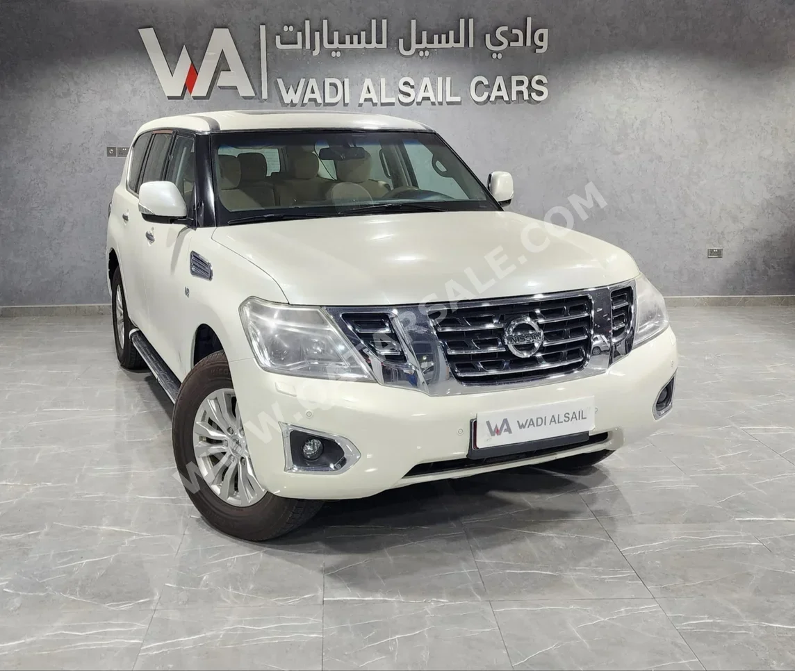 Nissan  Patrol  SE  2015  Automatic  224,000 Km  8 Cylinder  Four Wheel Drive (4WD)  SUV  White