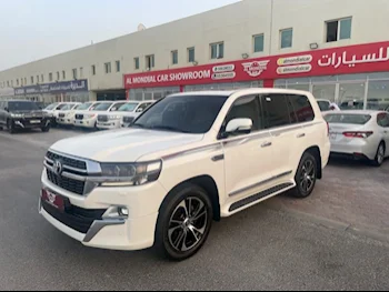 Toyota  Land Cruiser  GXR- Grand Touring  2021  Automatic  32,000 Km  6 Cylinder  Four Wheel Drive (4WD)  SUV  White