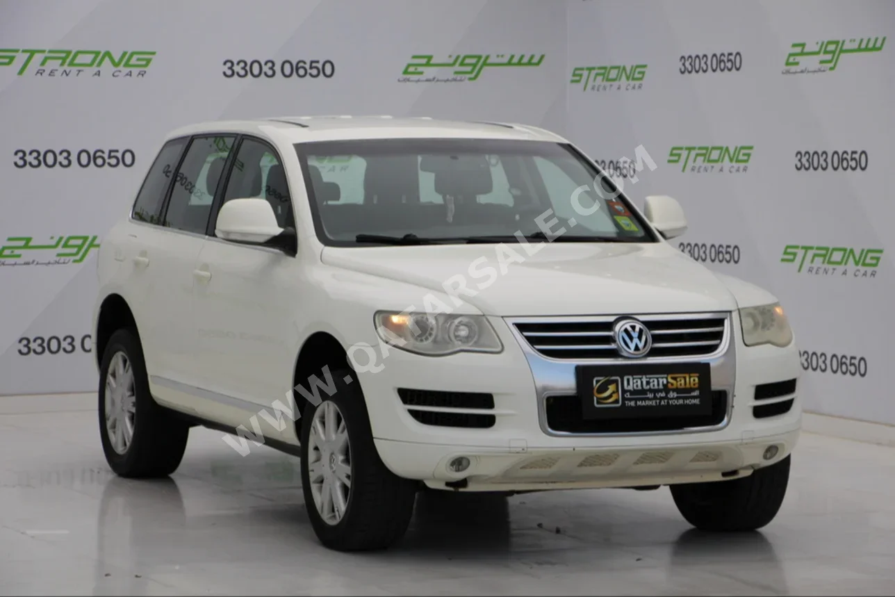  Volkswagen  Touareg  2010  Automatic  133,000 Km  6 Cylinder  All Wheel Drive (AWD)  SUV  White  With Warranty