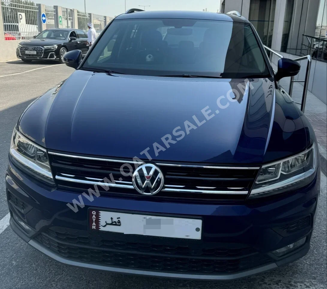 Volkswagen  Tiguan  2.0 TSI  2020  Automatic  78,000 Km  4 Cylinder  All Wheel Drive (AWD)  SUV  Dark Blue  With Warranty