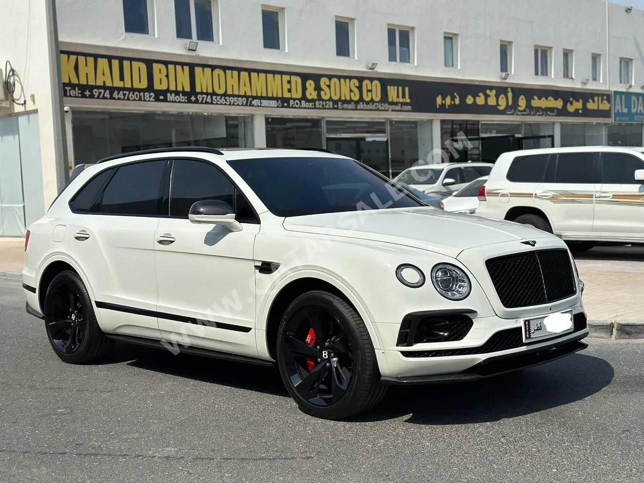 Bentley  Bentayga  2018  Automatic  30,000 Km  12 Cylinder  Four Wheel Drive (4WD)  SUV  White