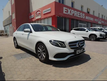 Mercedes-Benz  E-Class  200  2019  Automatic  65,000 Km  4 Cylinder  Rear Wheel Drive (RWD)  Sedan  White