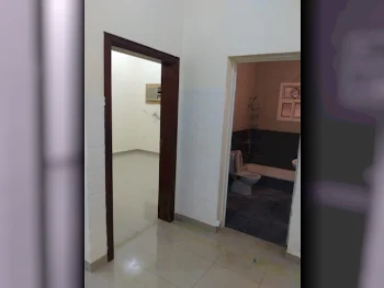 2 Bedrooms  Apartment  For Rent  in Umm Salal -  Umm Al Amad  Not Furnished