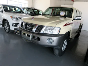 Nissan  Patrol  Safari  2019  Manual  73,000 Km  6 Cylinder  Four Wheel Drive (4WD)  SUV  Beige  With Warranty