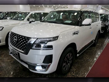 Nissan  Patrol  Titanium  2024  Automatic  0 Km  6 Cylinder  Four Wheel Drive (4WD)  SUV  White  With Warranty