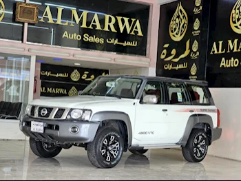  Nissan  Patrol  Super Safari  2023  Manual  16,000 Km  6 Cylinder  Four Wheel Drive (4WD)  SUV  White  With Warranty