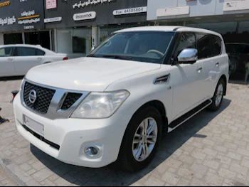 Nissan  Patrol  LE  2013  Automatic  218,000 Km  8 Cylinder  Four Wheel Drive (4WD)  SUV  White