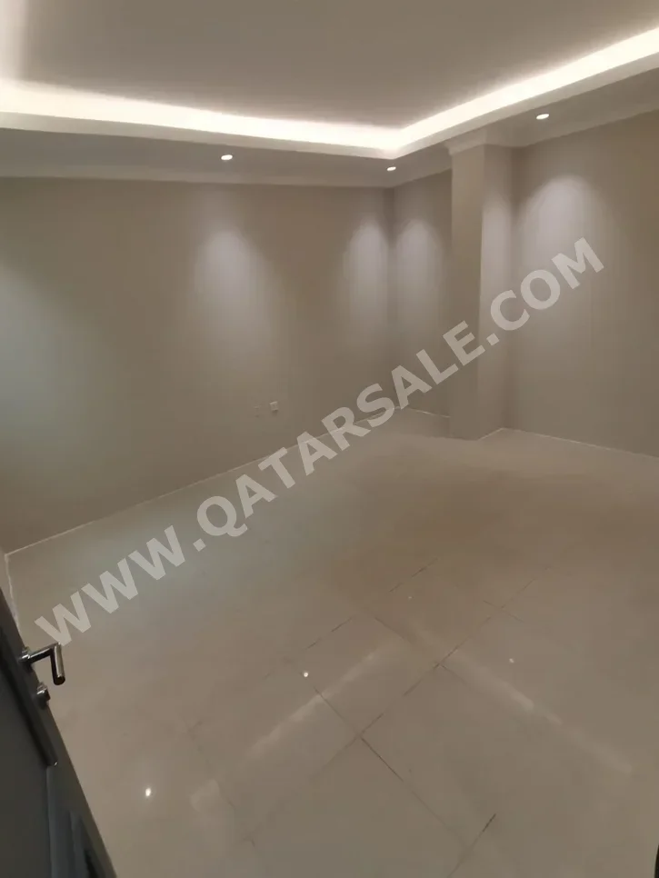 2 Bedrooms  Apartment  in Doha -  Najma  Not Furnished