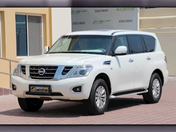 Nissan  Patrol  SE  2014  Automatic  511,000 Km  8 Cylinder  Four Wheel Drive (4WD)  SUV  White