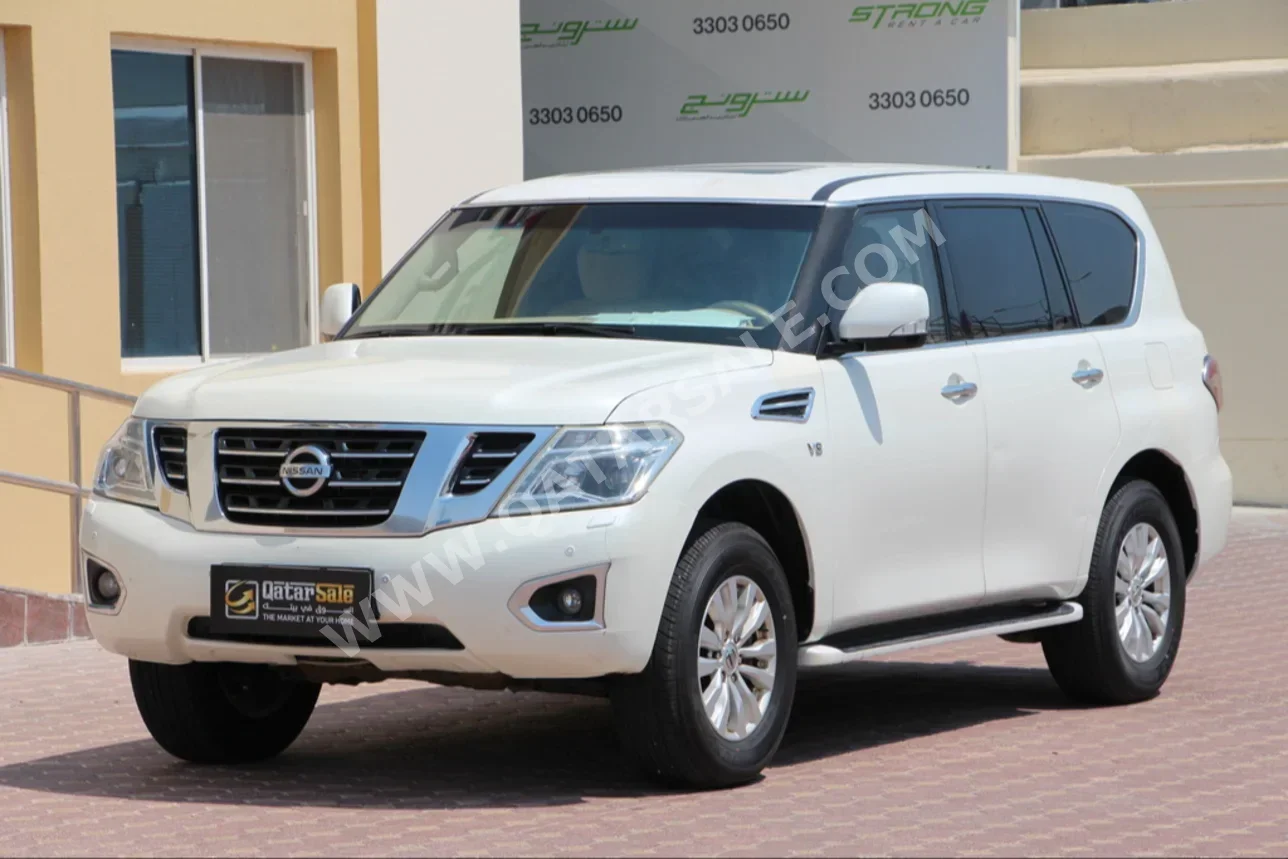 Nissan  Patrol  SE  2014  Automatic  511,000 Km  8 Cylinder  Four Wheel Drive (4WD)  SUV  White