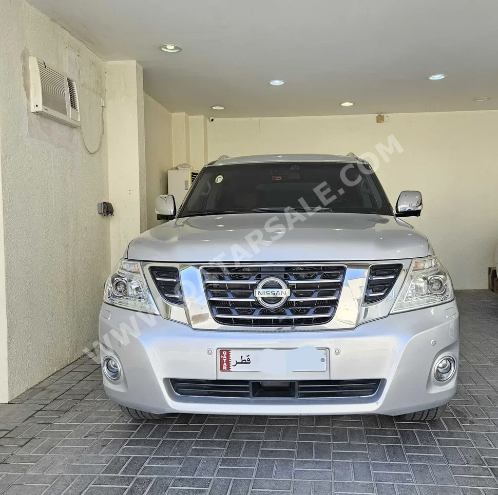 Nissan  Patrol  Platinum  2015  Automatic  131,000 Km  8 Cylinder  Four Wheel Drive (4WD)  SUV  Silver