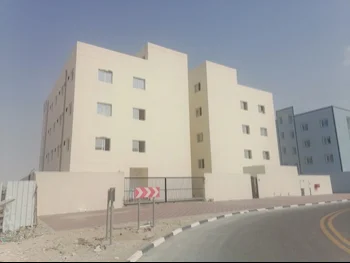 Buildings, Towers & Compounds - Labour building  - Al Wakrah  - Barkit Al Awamer  For Sale