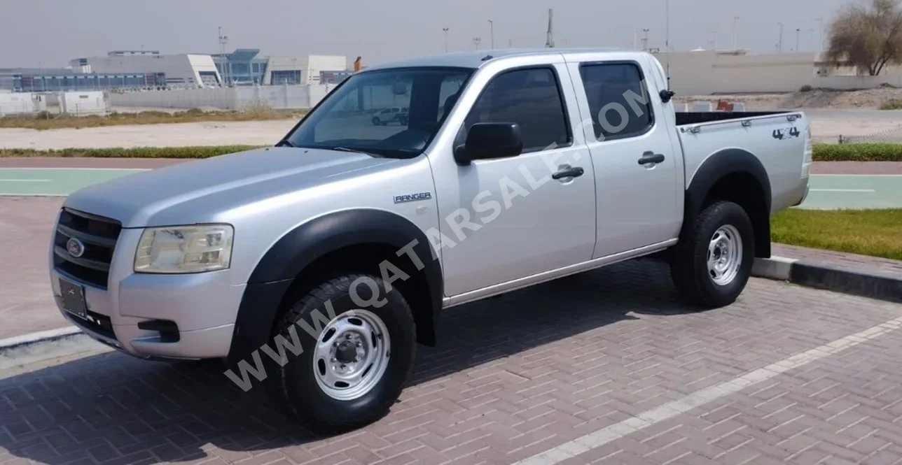 Ford  Ranger  2009  Manual  140,000 Km  4 Cylinder  Four Wheel Drive (4WD)  Pick Up  Silver