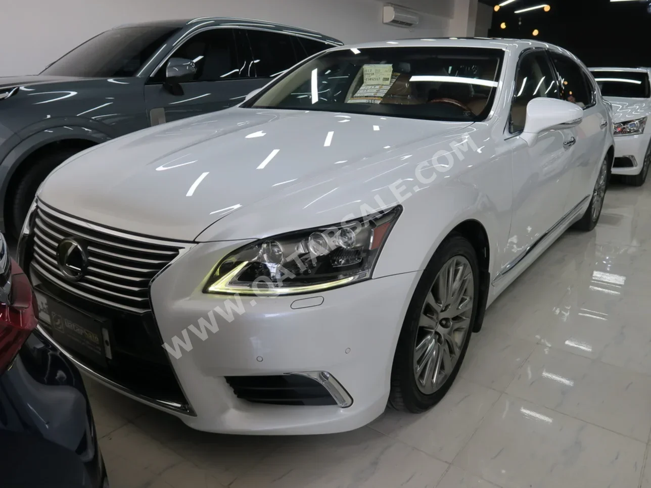 Lexus  LS  460 L  2014  Automatic  59,000 Km  8 Cylinder  Rear Wheel Drive (RWD)  Sedan  White