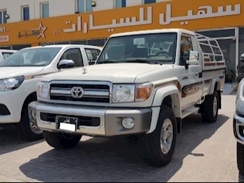 Toyota  Land Cruiser  LX  2022  Manual  9,000 Km  6 Cylinder  Four Wheel Drive (4WD)  Pick Up  White  With Warranty