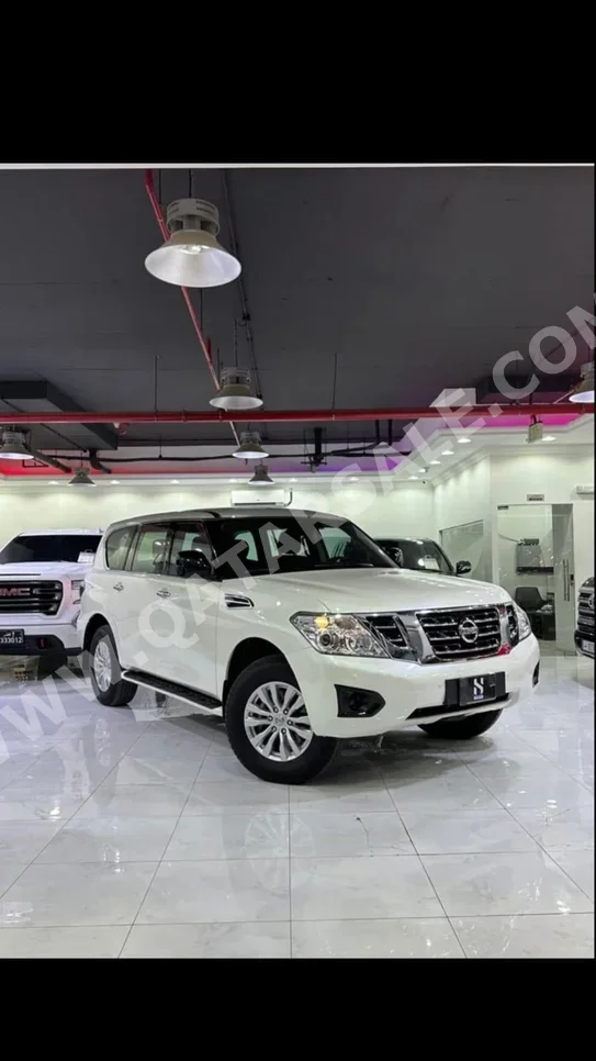 Nissan  Patrol  2019  Manual  172,000 Km  6 Cylinder  Four Wheel Drive (4WD)  SUV  White