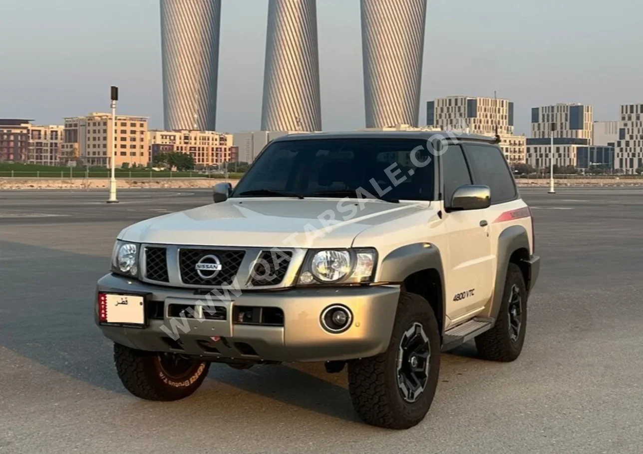 Nissan  Patrol  Super Safari  2022  Manual  22,500 Km  6 Cylinder  Four Wheel Drive (4WD)  SUV  White and Golden  With Warranty