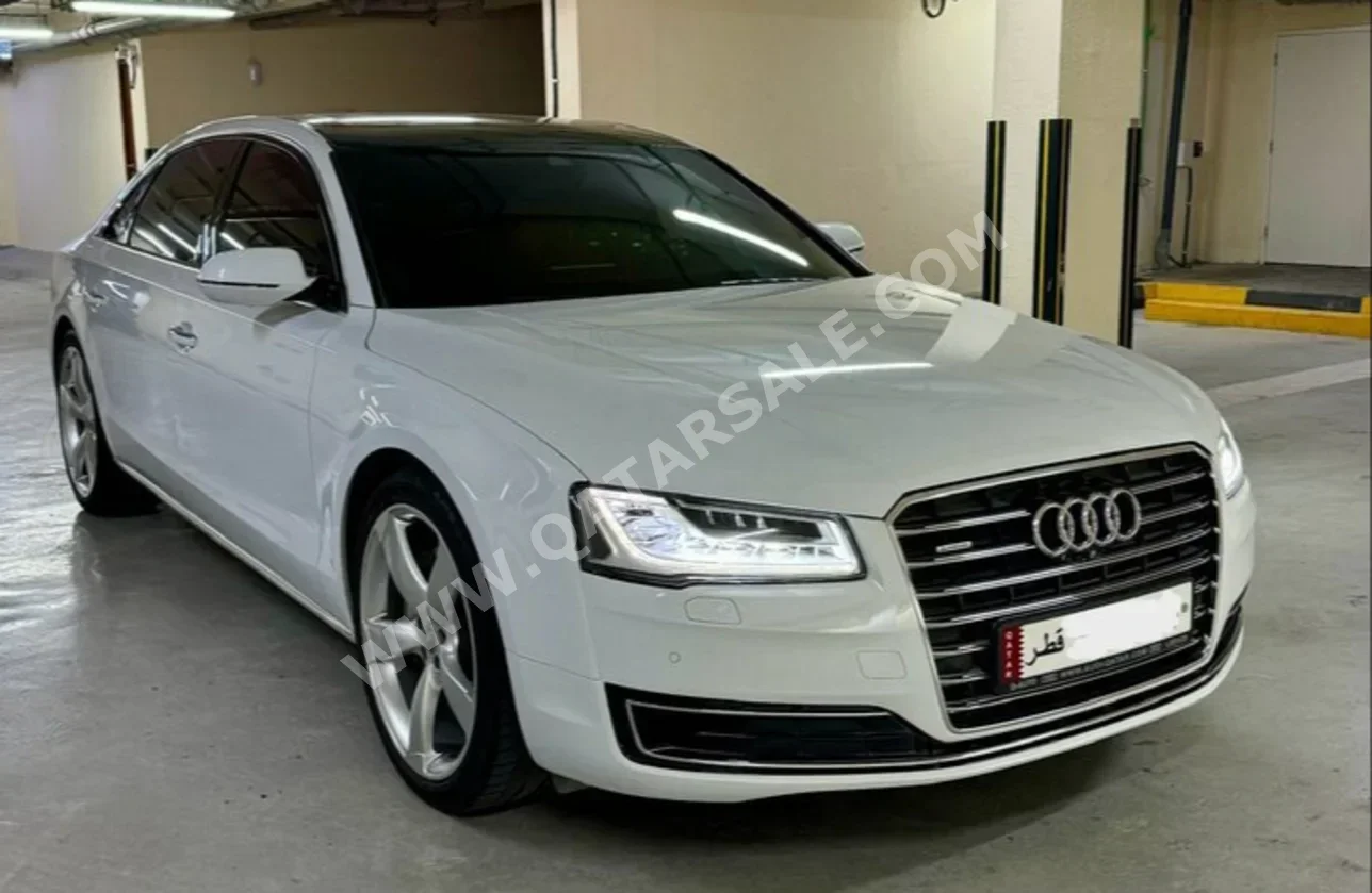 Audi  A8  TFSI Quattro  2016  Automatic  34,000 Km  6 Cylinder  All Wheel Drive (AWD)  Sedan  White