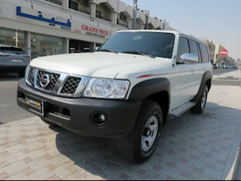 Nissan  Patrol  GL  2023  Automatic  10,000 Km  6 Cylinder  Four Wheel Drive (4WD)  SUV  White  With Warranty