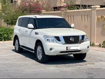 Nissan  Patrol  SE  2013  Automatic  300,000 Km  8 Cylinder  Four Wheel Drive (4WD)  SUV  White