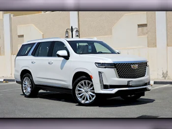  Cadillac  Escalade  Premium  2024  Automatic  0 Km  8 Cylinder  Four Wheel Drive (4WD)  SUV  White  With Warranty