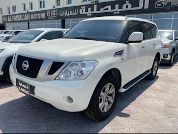 Nissan  Patrol  SE  2013  Automatic  248,000 Km  8 Cylinder  Four Wheel Drive (4WD)  SUV  White