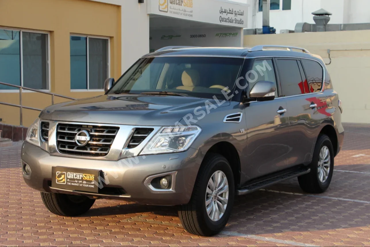 Nissan  Patrol  SE  2015  Automatic  229,000 Km  8 Cylinder  Four Wheel Drive (4WD)  SUV  Gray