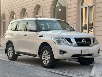 Nissan  Patrol  SE  2013  Automatic  291,000 Km  8 Cylinder  Four Wheel Drive (4WD)  SUV  White