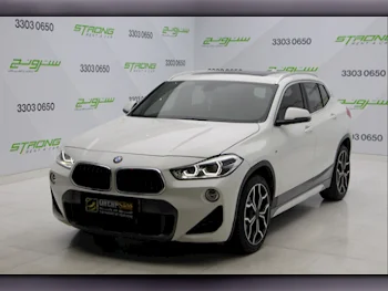 BMW  X-Series  X2 M  2020  Automatic  34,000 Km  4 Cylinder  Front Wheel Drive (FWD)  SUV  White