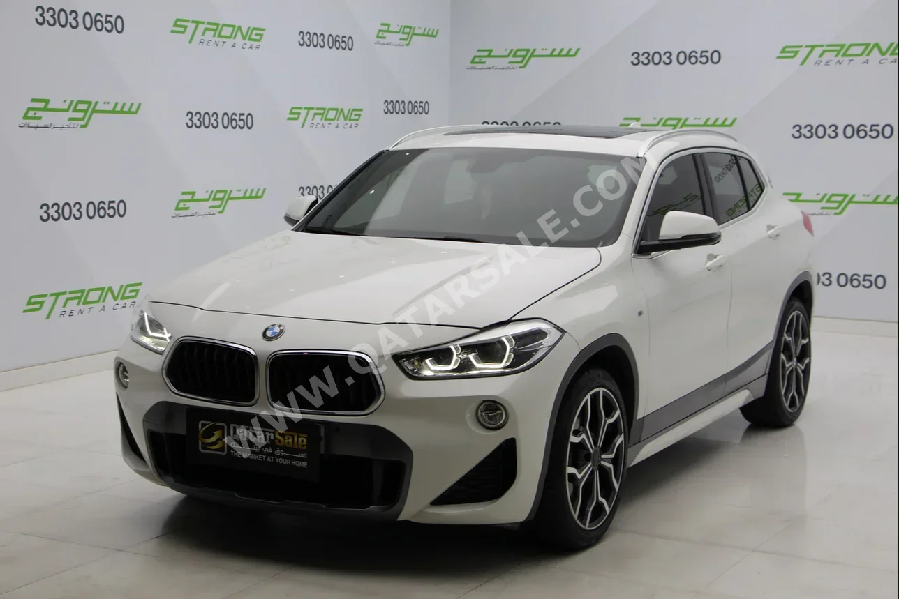 BMW  X-Series  X2 M  2020  Automatic  34,000 Km  4 Cylinder  Front Wheel Drive (FWD)  SUV  White