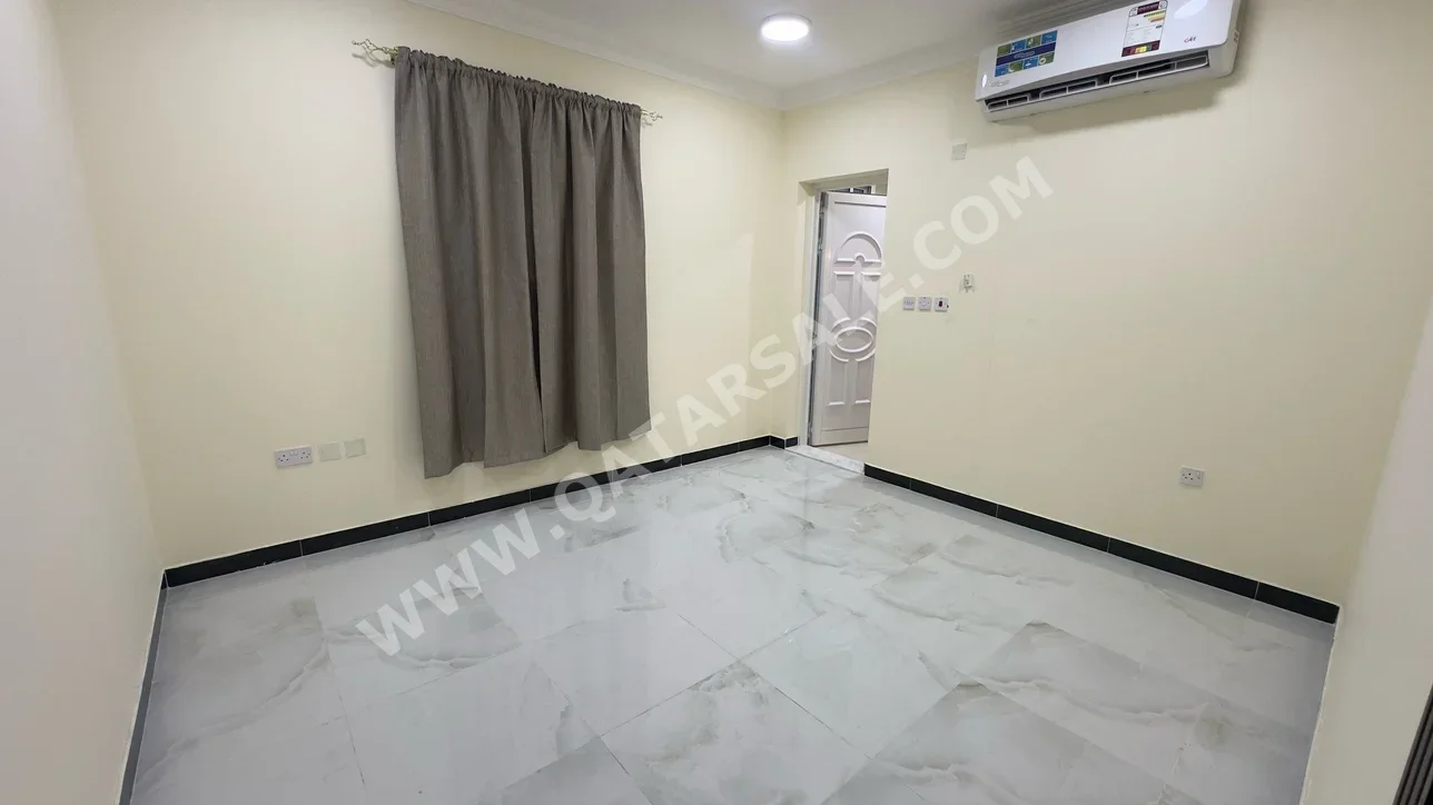 2 Bedrooms  Apartment  For Rent  in Doha -  Fereej Bin Mahmoud  Not Furnished