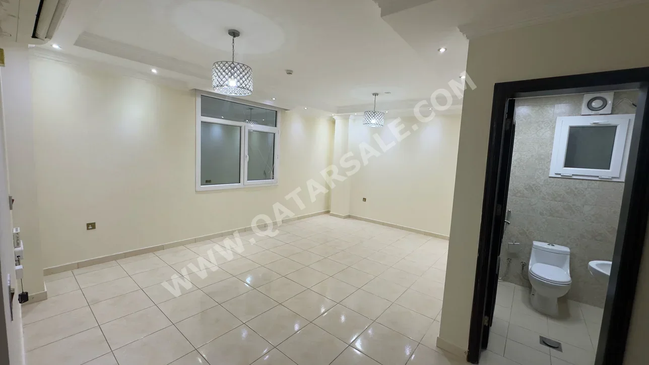 2 Bedrooms  Apartment  For Rent  in Doha -  Fereej Bin Mahmoud  Not Furnished