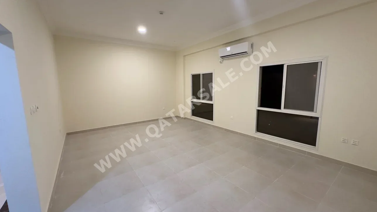 2 Bedrooms  Apartment  For Rent  in Doha -  Fereej Al Nasr  Not Furnished