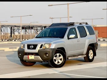 Nissan  Xterra  SE  2010  Automatic  183,000 Km  6 Cylinder  Four Wheel Drive (4WD)  SUV  Silver  With Warranty