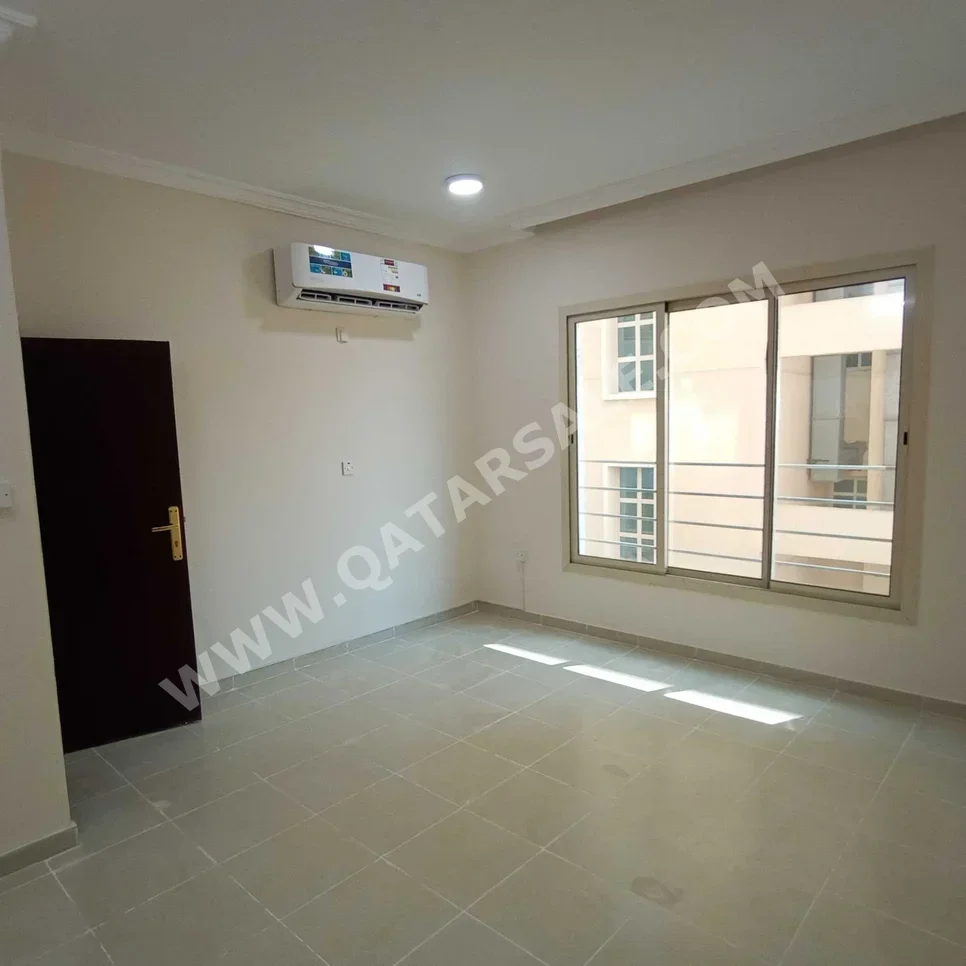 3 Bedrooms  Apartment  For Rent  in Doha -  Al Mansoura  Not Furnished