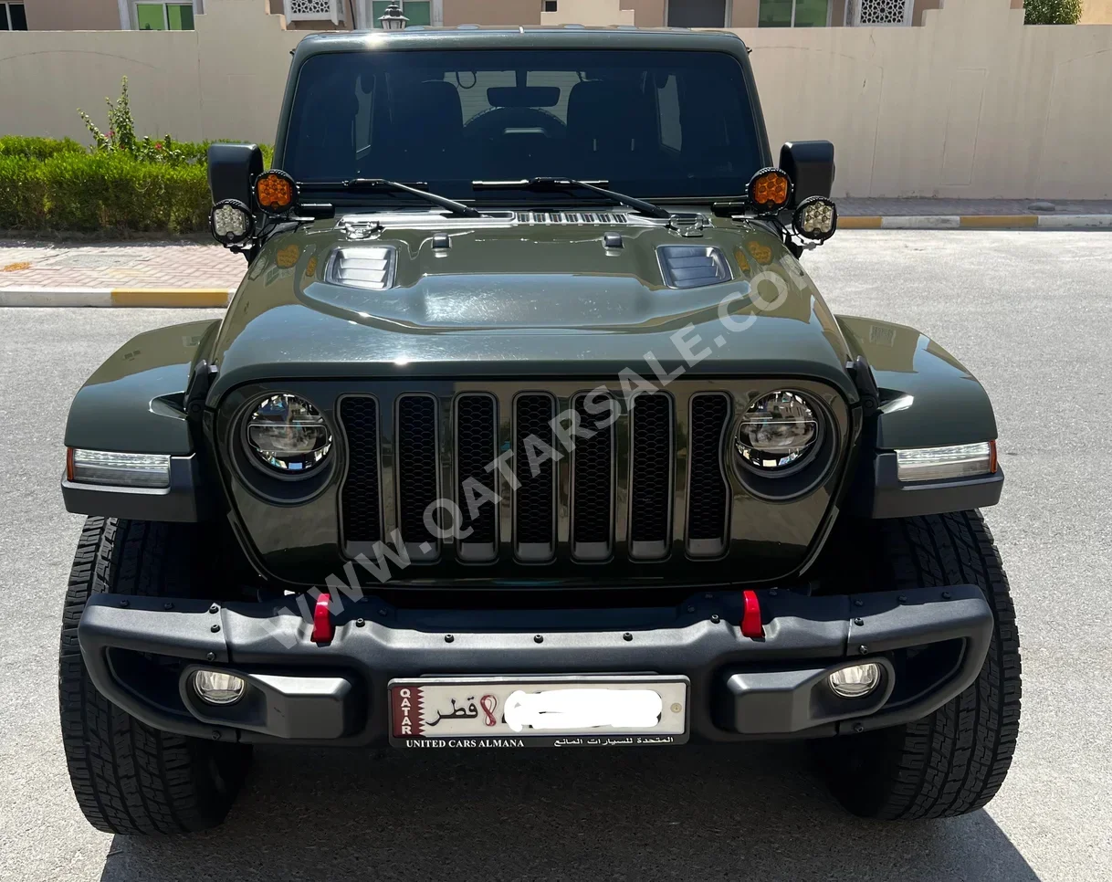 Jeep  Wrangler  Rubicon  2022  Automatic  31,500 Km  6 Cylinder  Four Wheel Drive (4WD)  SUV  Green and Black  With Warranty